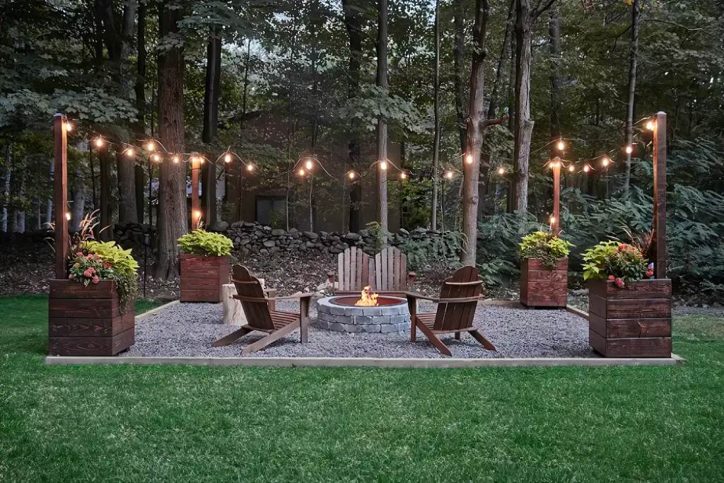 backyard BBQ under draped waterproof outdoor rope lights at dusk, with grill smoke and laughing guests