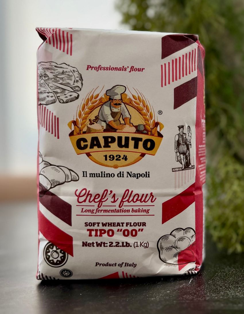 Bag of Caputo 00 flour on a kitchen counter for pizza making.