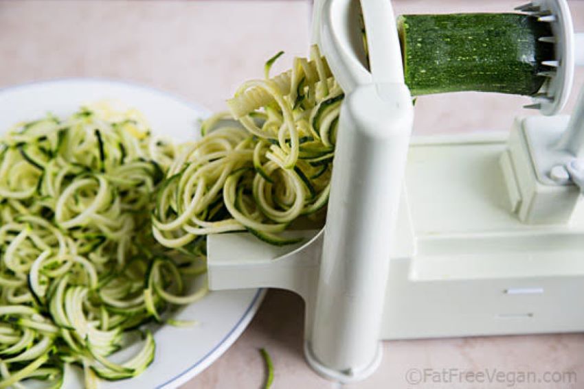 Fresh zucchini noodles made with a vegetable spiralizer in a Texas kitchen